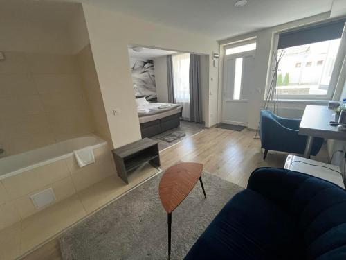 Χώρος καθιστικού στο Brill Hotel Békéscsaba