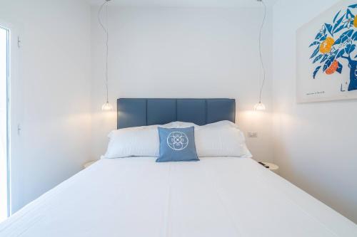 Ein Bett oder Betten in einem Zimmer der Unterkunft Dimore delle Zagare Molo