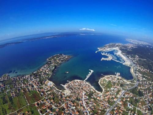 an aerial view of a city and the ocean at Holiday Home Marko by Interhome in Sukošan