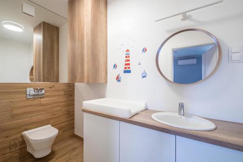 Koupelna v ubytování Flatbook Apartamenty - Krynica Morska Nautikka Park