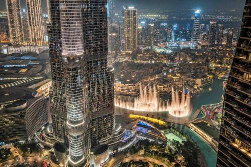 Luxe 3BR Retreat, Balcony Burj & Fountain Views, Prime Downtown Stay