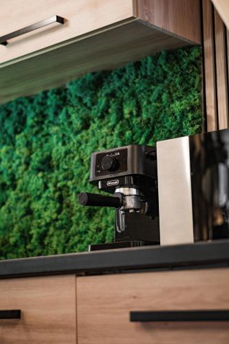 a camera on top of a counter in a cabinet at A kégli in Háromhuta