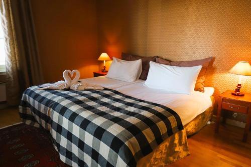 Cama o camas de una habitación en Brodderud Apartments