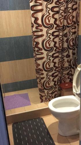 Un baño de Anand Villa Guest House