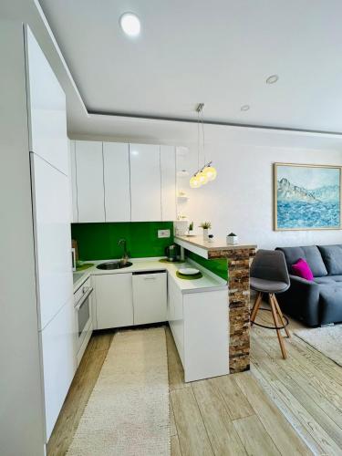 Η κουζίνα ή μικρή κουζίνα στο Laura Apartman