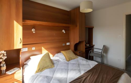 Ένα ή περισσότερα κρεβάτια σε δωμάτιο στο Appart Hotel Corte HR