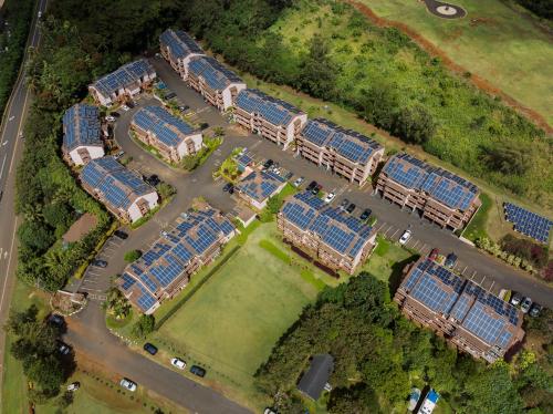 an overhead view of a group of blue solar arrays at Banyan Harbor Resort in Lihue