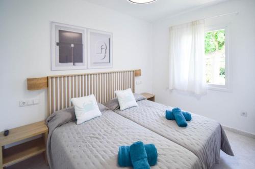 Ένα ή περισσότερα κρεβάτια σε δωμάτιο στο Apartamento Biniforcat 41