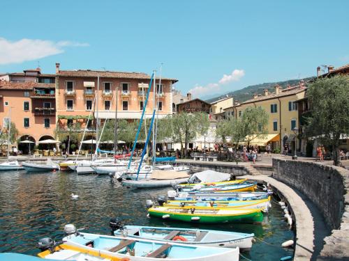 a group of boats are docked in a harbor at Apartment Adelaide by Interhome in Albisano