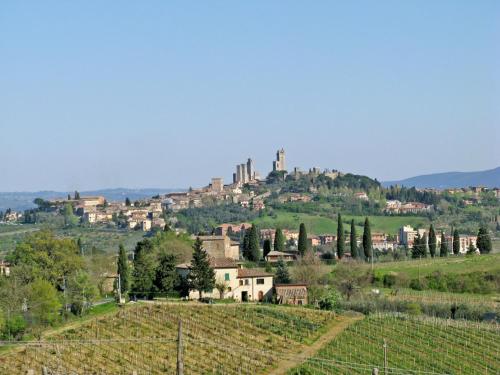 a town on a hill with a castle on it at Apartment Lari-2 by Interhome in Luiano