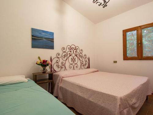 Ένα ή περισσότερα κρεβάτια σε δωμάτιο στο Holiday Home Segreti by Interhome