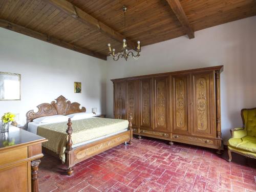 Postel nebo postele na pokoji v ubytování Holiday Home Il Leccio by Interhome