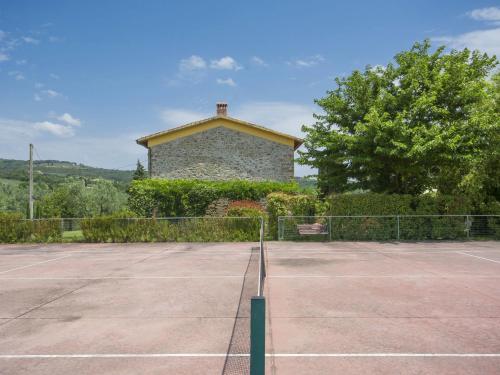 Tenis a/nebo squash v ubytování Holiday Home Il Leccio by Interhome nebo okolí