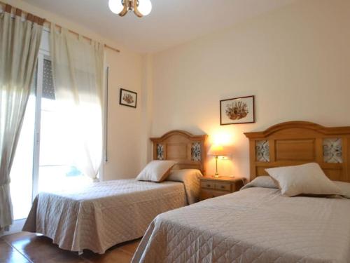 Ένα ή περισσότερα κρεβάτια σε δωμάτιο στο Villa Benifer