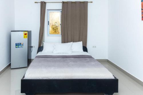 Krevet ili kreveti u jedinici u okviru objekta Tills Beach Resort