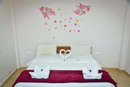 Ένα ή περισσότερα κρεβάτια σε δωμάτιο στο Evan's Nest