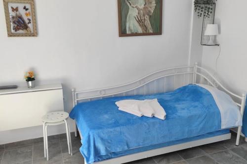 Katil atau katil-katil dalam bilik di Faros Sea View - Sifnos