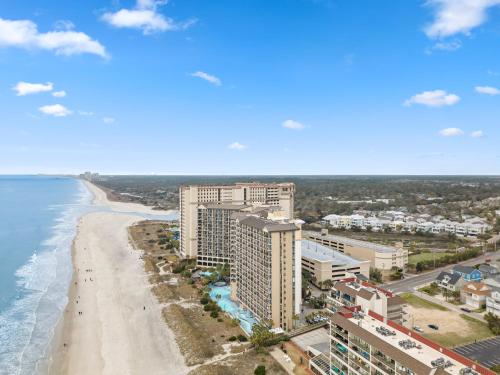 an aerial view of the beach and buildings at Luxury Ocean Front By Barefoot Landing in Myrtle Beach