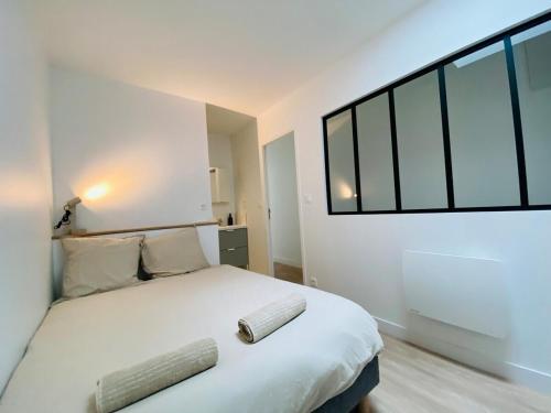 เตียงในห้องที่ Casa Gardot