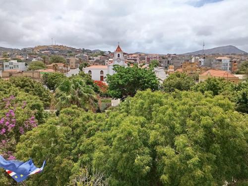 a view of a city from above the trees at Hotel Viajante in Tarrafal