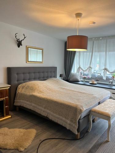 En eller flere senge i et værelse på Unterkunft am Rotweinwanderweg