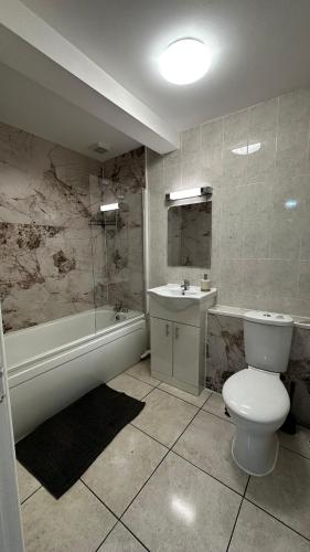 Ένα μπάνιο στο Portobello Guest Rooms