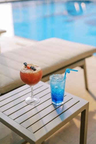 Bazén v ubytování Khalidia Palace Hotel Dubai by Mourouj Gloria nebo v jeho okolí