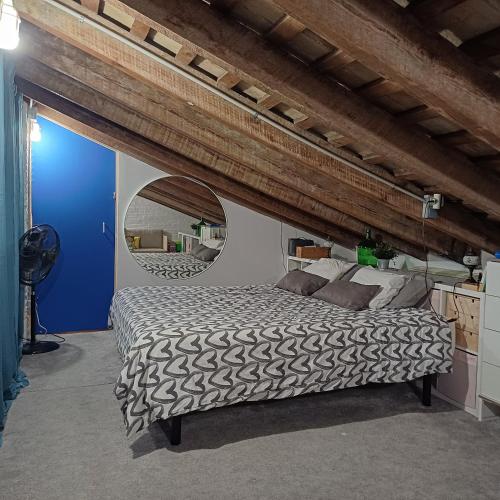 a bedroom with a large bed in a room at La Auténtica in Valencia