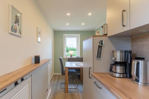 Dapur atau dapur kecil di Ferienhaus De lütte Mööv