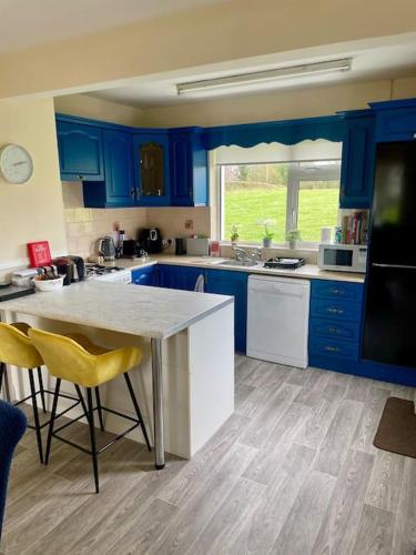 Kuchyň nebo kuchyňský kout v ubytování Smarmore Cottage