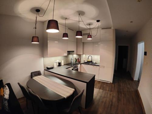 Kuchyň nebo kuchyňský kout v ubytování EuroApart - Parking - Goszczyńskiego 7a