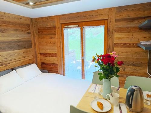 Llit o llits en una habitació de Le Cocon Des Pistes