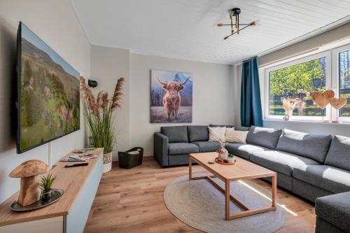 Posezení v ubytování Gruppen & Familien-Ferienhaus Hänsel