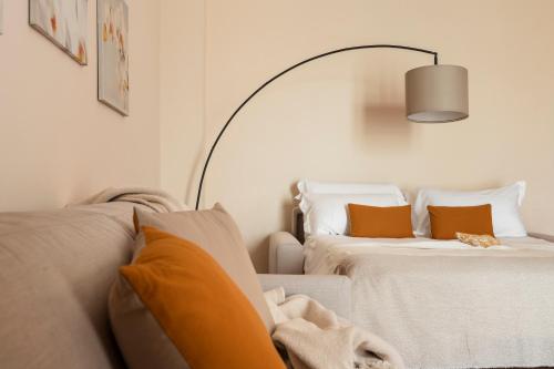 Letto o letti in una camera di Villa Erbaia Relais de Charme