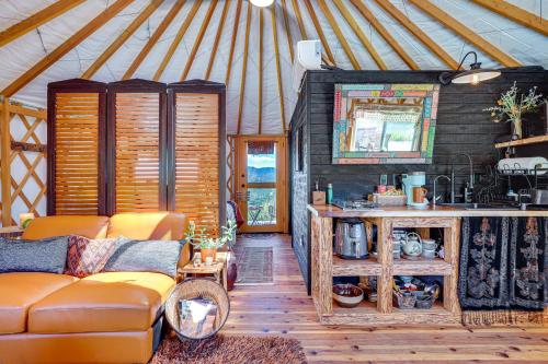 a living room of a yurt with a couch and a mirror at Mystical Mongolian Yurt in Fallbrook with Views! in Temecula