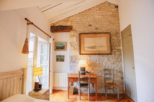Ένα ή περισσότερα κρεβάτια σε δωμάτιο στο Villa Le Passe simple