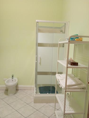 a bathroom with a shower and a toilet at millennium holiday in Castellammare del Golfo