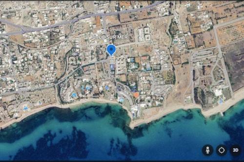 a map of a city with a blue marker at Vue sur Mer in Nabeul