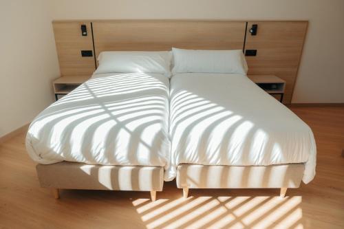 Ένα ή περισσότερα κρεβάτια σε δωμάτιο στο Mouritz Rooms