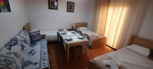 Postel nebo postele na pokoji v ubytování Vila Jone