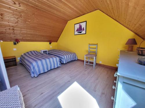 Cama o camas de una habitación en 391-Authentique penty, vue mer, proche plage
