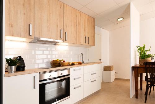 Η κουζίνα ή μικρή κουζίνα στο La flama del Ter, un loft preciós amb pati privat i estufa de flames