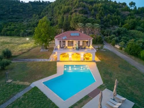 an aerial view of a house with a swimming pool at Antinea Olympian Villa in Olympia