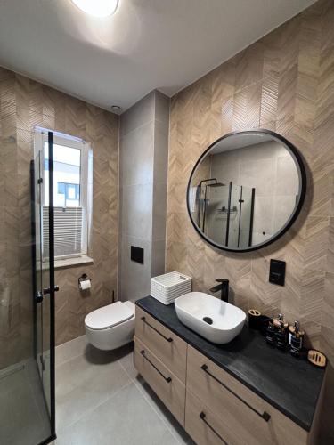 Ένα μπάνιο στο Apartamenty Wiejska34