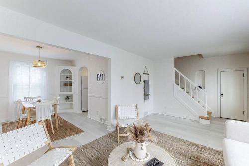 a living room with a couch and a table at The Perfect Pass-HOF Village Escape in Canton