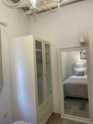 Katil atau katil-katil dalam bilik di Geronti Moscha Apartment