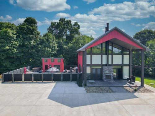 a red and white building with a pavilion at Some Kind of Wonderful-Escape Near Seneca Lake in Senecaville