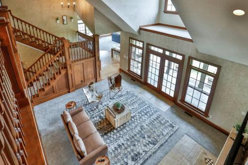 an overhead view of a living room with a couch at Grace and Grandeur-The Stables Estate in North Lawrence