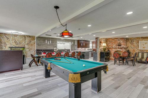 a living room with a pool table in it at about 2 Blocks to Beach Galveston Group Getaway! in Galveston