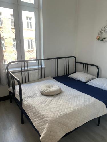 Posteľ alebo postele v izbe v ubytovaní Apartament Mikolowska 9
